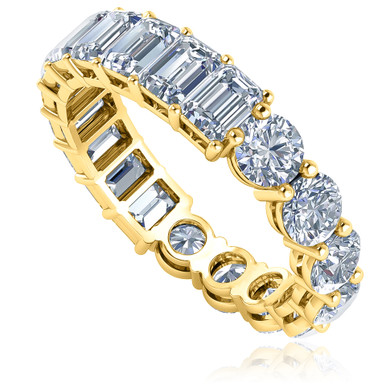 Alternity .25 carat round and emerald step cut lab created diamond simulant eternity band in 14k yellow gold.