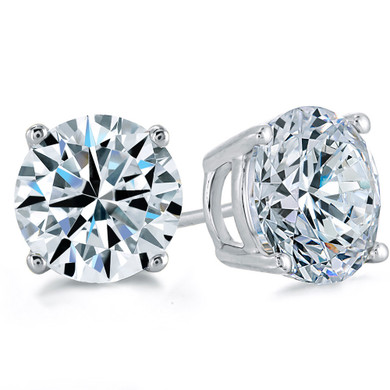 Round 1.5 carat each lab created diamond simulant cubic zirconia four prong basket set stud earrings in 18k white gold.