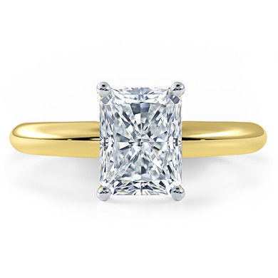 Emerald radiant cut lab grown diamond simulant cubic zirconia four prong classic solitaire engagement ring in 14k yellow gold.