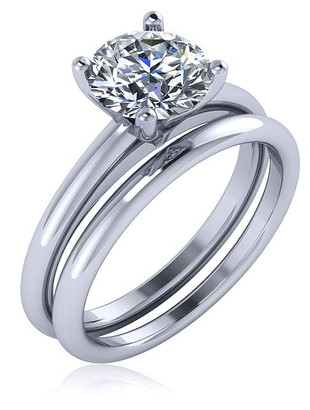 Quatra 1 carat round lab grown diamond look cubic zirconia four prong solitaire with matching band wedding set in 14k white gold.