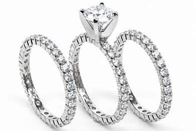 Round 1 Carat Three Ring Eternity Stacking Wedding Set with lab grown diamond simulant cubic zirconia in 14k white gold.