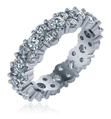 Alternating single and double round prong set laboratory grown diamond simulant cubic zirconia eternity band in 14k white gold.