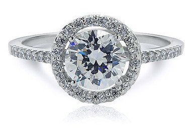 Tori 1 carat round micro pave halo lab grown diamond simulant cubic zirconia solitaire engagement ring in 14k white gold.