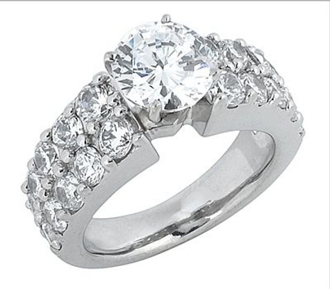 Round 2.5 Carat Double Row Channel Solitaire with lab grown diamond alternative cubic zirconia in 14k gold.