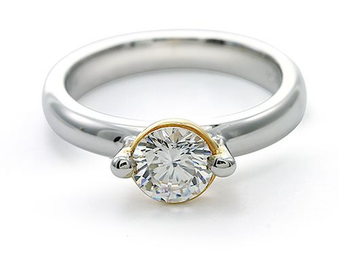 Floating Bezel Set 1 Carat Round Engagement Ring with lab grown diamond simulant cubic zirconia in platinum.