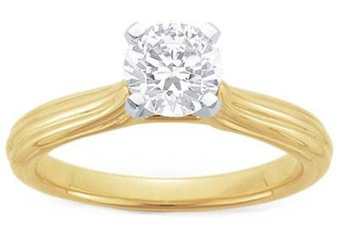 Fluted 1 Carat Round Cathedral Style Solitaire Engagement Ring with laboratory grown diamond look cubic zirconia in 14k yellow gold.