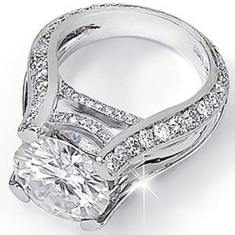 Burke 4 carat round and pave lab grown diamond simulant cubic zirconia split shank solitaire engagement ring in 14k white gold.