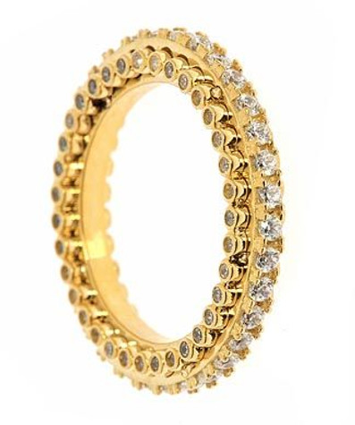 Bezel and prong set round laboratory grown diamond alternative cubic zirconia eternity wedding band in 14k yellow gold.