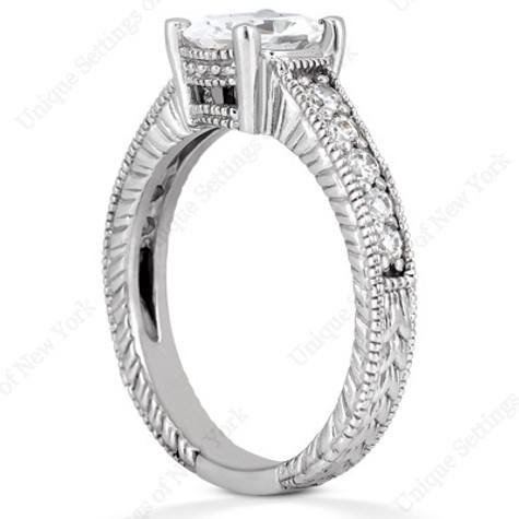 Claudine 2.5 carat oval lab grown diamond quality cubic zirconia pave engraved engagement ring in platinum.