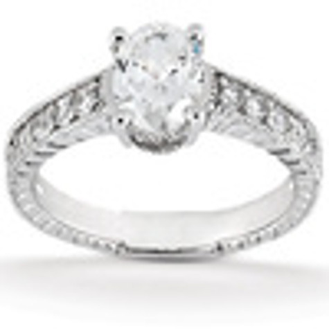 Claudine 1 carat oval  lab grown diamond quality cubic zirconia pave engraved solitaire engagement ring in 18k white gold.