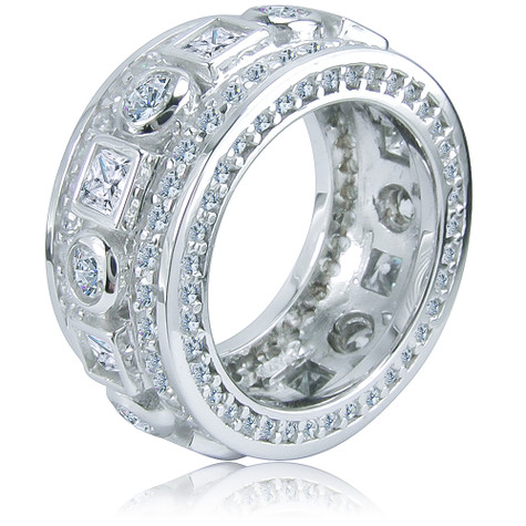 Bezel set round and princess cut laboratory grown diamond simulant cubic zirconia pave set round eternity band in platinum.