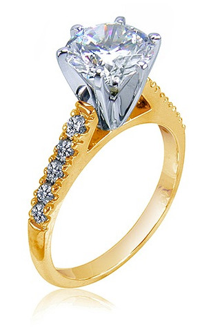 Impresso 1.5 carat round center with pave set laboratory grown diamond look cubic zirconia in a cathedral style setting in 14k yellow gold.