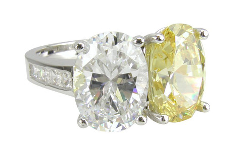 Hilton 2.5 carat two stone oval laboratory grown diamond simulant cubic zirconia engagement ring in platinum.