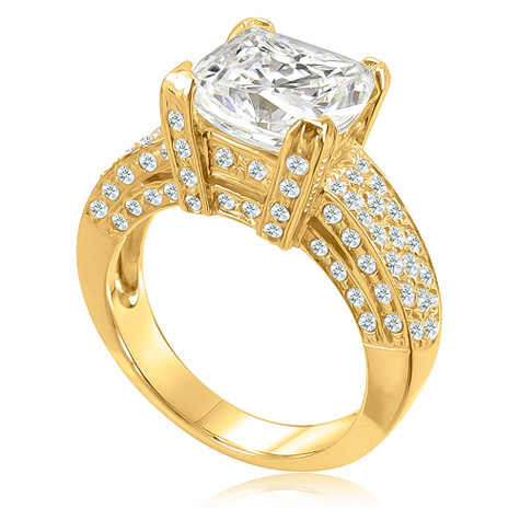 Cushion cut 4 carat laboratory grown diamond alternative cubic zirconia pave solitaire engagement ring in 14k yellow gold.