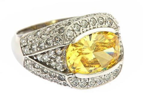 Seeker 4 carat oval canary semi bezel set lab grown diamond simulant cubic zirconia pave ring in platinum.