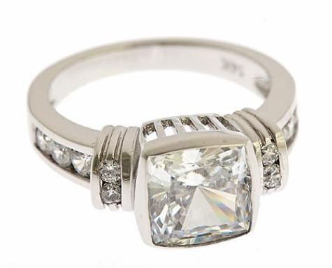 Cushing 2.5 carat bezel set cushion cut laboratory grown diamond simulant square engagement ring in platinum.