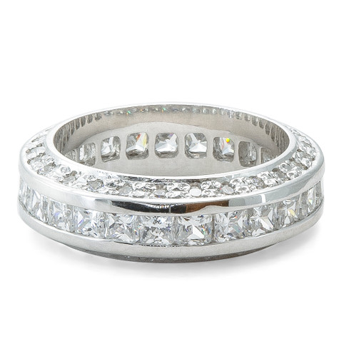 Channel set princess cut and pavé set round lab-grown diamond simulant cubic zirconia eternity band in 14k gold or platinum.