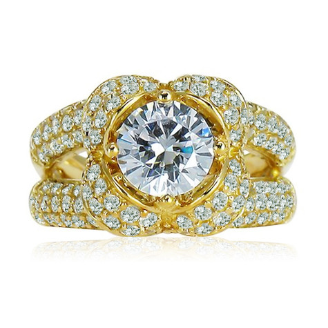 Ribbon 1.5 carat round and pave lab grown diamond simulant cubic zirconia engagement ring in 18k yellow gold.