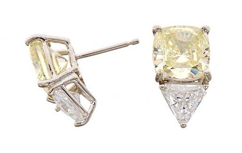 Aimee 2.5 carat canary cushion cut lab grown diamond alternative cubic zirconia 1.5 carat trillion stud earrings in 14k yellow gold.