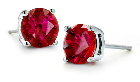 Round 1 carat each man made laboratory created synthetic ruby gemstone stud earrings in 14k white gold.