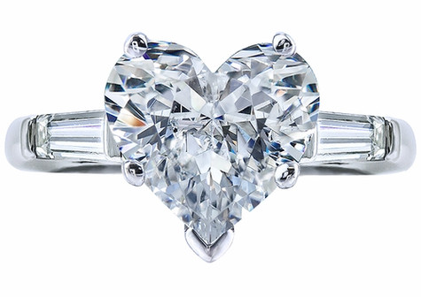 Heart shape lab grown diamond alternative cubic zirconia baguette solitaire engagement ring in 14k white gold.