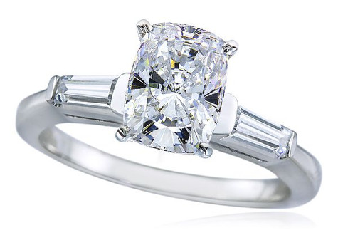 Elongated cushion cut lab grown diamond alternative cubic zirconia baguette solitaire engagement ring in 14k white gold.