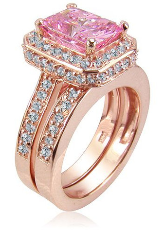 Elegant Emerald 5.5 carat pink lab grown diamond quality cubic zirconia pave set halo cathedral wedding set in 14k rose gold.