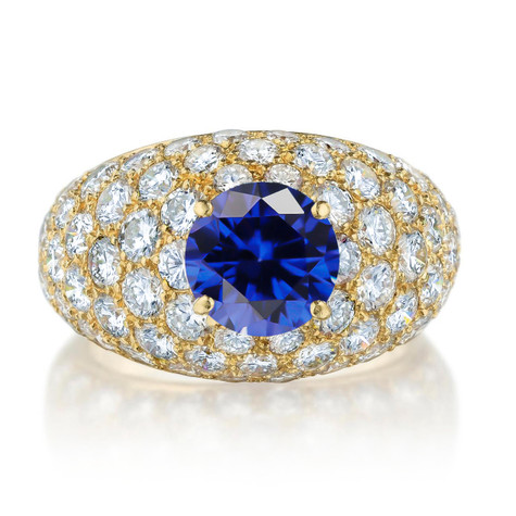 DeRosier domed 2 carat round double prong lab grown blue sapphire and lab grown diamond look cubic zirconia pave ring in 14k yellow gold.