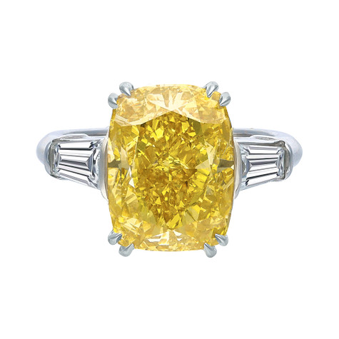 Elongated cushion cut canary laboratory grown diamond alternative cubic zirconia baguette solitaire ring in 14K white gold.