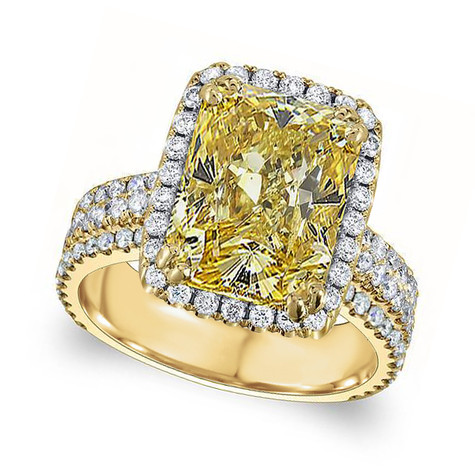 Emerald cut 9 carat canary halo lab grown diamond alternative cubic zirconia three stone engagement ring in 18K yellow gold.