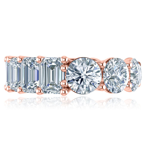 Alternity .75 carat round and emerald step cut laboratory grown diamond alternative cubic zirconia eternity band in 14k rose gold.