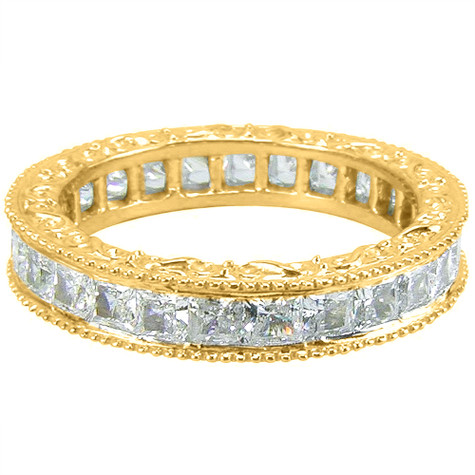 Engraved victorian channel set princess cut lab grown diamond simulant cubic zirconia engraved eternity wedding band in yellow gold.