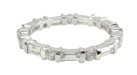 Baguette and round lab grown diamond simulant cubic zirconia channel set bar set eternity band in 14k white gold.