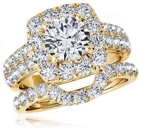 Kingston 1.5 carat round laboratory grown diamond simulant cubic zirconia halo bridal wedding set in 14k yellow gold.