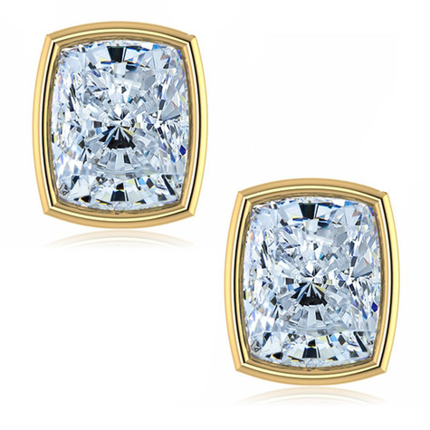 Elongated cushion cut bezel set lab grown diamond look cubic zirconia stud earrings in 14k yellow gold.