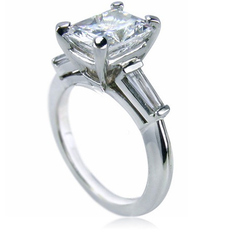 Sex and the City Charlotte 4 Carat Emerald Step Cut Baguette Solitaire with simulated lab grown diamond look cubic zirconia in platinum.