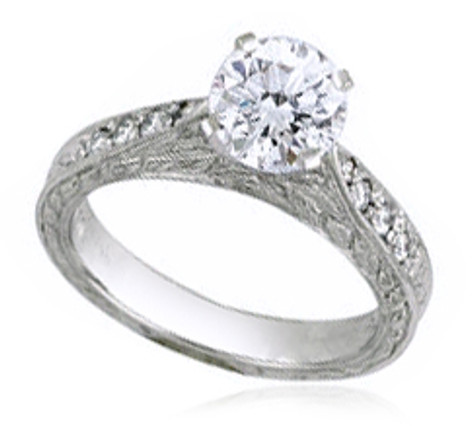 Round 1 Carat Cathedral Engraved Solitaire with lab grown diamond simulant cubic zirconia in 14k white gold.