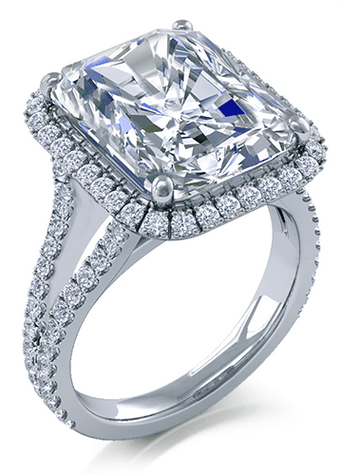 Emerald cut 7 carat micro pave lab created cubic zirconia halo engagement ring in 18k white gold.