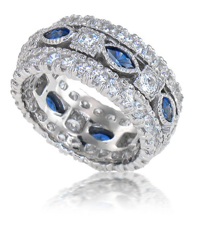 Man made sapphire marquise and round lab grown diamond quality cubic zirconia eternity band in platinum.