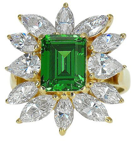 Emerald cut 2.5 carat step cut and marquise lab grown diamond quality cubic zirconia cluster ballerina ring in 14k gold.