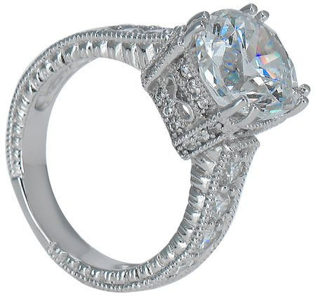 Jasmine 5.5 carat round lab created cubic zirconia engraved pave set solitaire in platinum.
