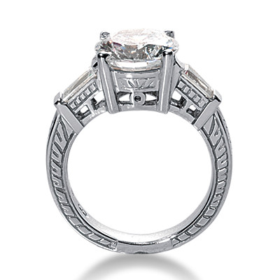 Antique estate style engraved 3.5 carat round and baguette lab grown diamond simulant cubic zirconia engagement ring in platinum.