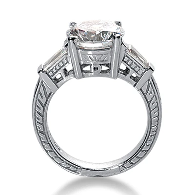 Antique estate style engraved 1.5 carat round and baguette lab grown diamond alternative cubic zirconia engagement ring in platinum.