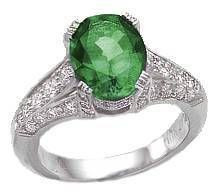 Pacifica lab grown diamond look cubic zirconia 2.5 carat oval man made emerald ring in platinum.
