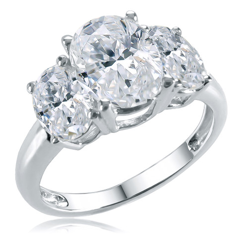 Oval 1.5 carat lab grown diamond simulant cubic zirconia three stone anniversary ring in solid 14k white gold.