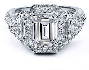 Larnacca 2.5 carat emerald step cut lab created cubic zirconia trillion halo and pave engagement ring in platinum.