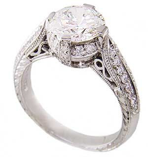 Charlottan 1 carat round lab grown diamond alternative cubic zirconia cathedral estate solitaire in 14k white gold.
