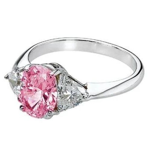 Legally Blonde 2 style 2.5 carat pink oval lab grown diamond alternative cubic zirconia trillion solitaire engagement ring in 14k white gold.