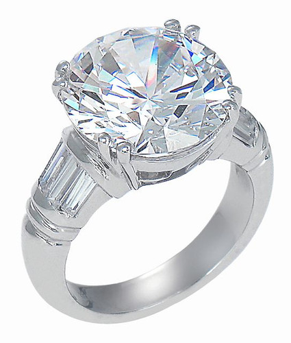 Charis 7 carat round lab created cubic zirconia split prong set solitaire with baguettes in 14k gold.