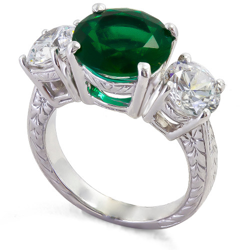 Sutton 4 carat green emerald round three stone lab grown diamond quality cubic zirconia ring in 14k white gold.